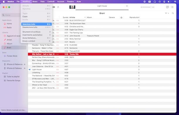 Selezionare con menu Musica